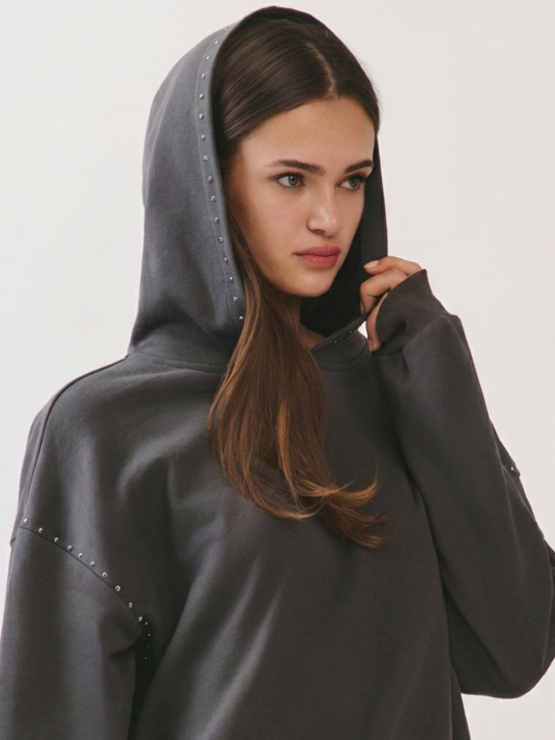 BTTRMMT Reese Studded Hoodie close-up of stud detailing along sleeves and soft fabric texture